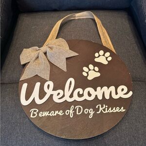 Welcome Beware of Dog Kisses Wall Sign - Brown